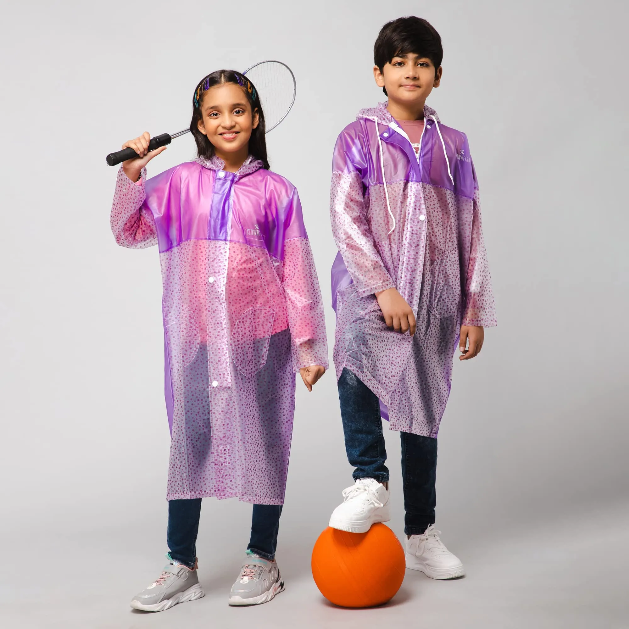 THE CLOWNFISH Misty Magic Series Unisex Kids Waterproof Single Layer PVC Longcoat/Raincoat with Adjustable Hood. Age-4-5 Years (Purple)