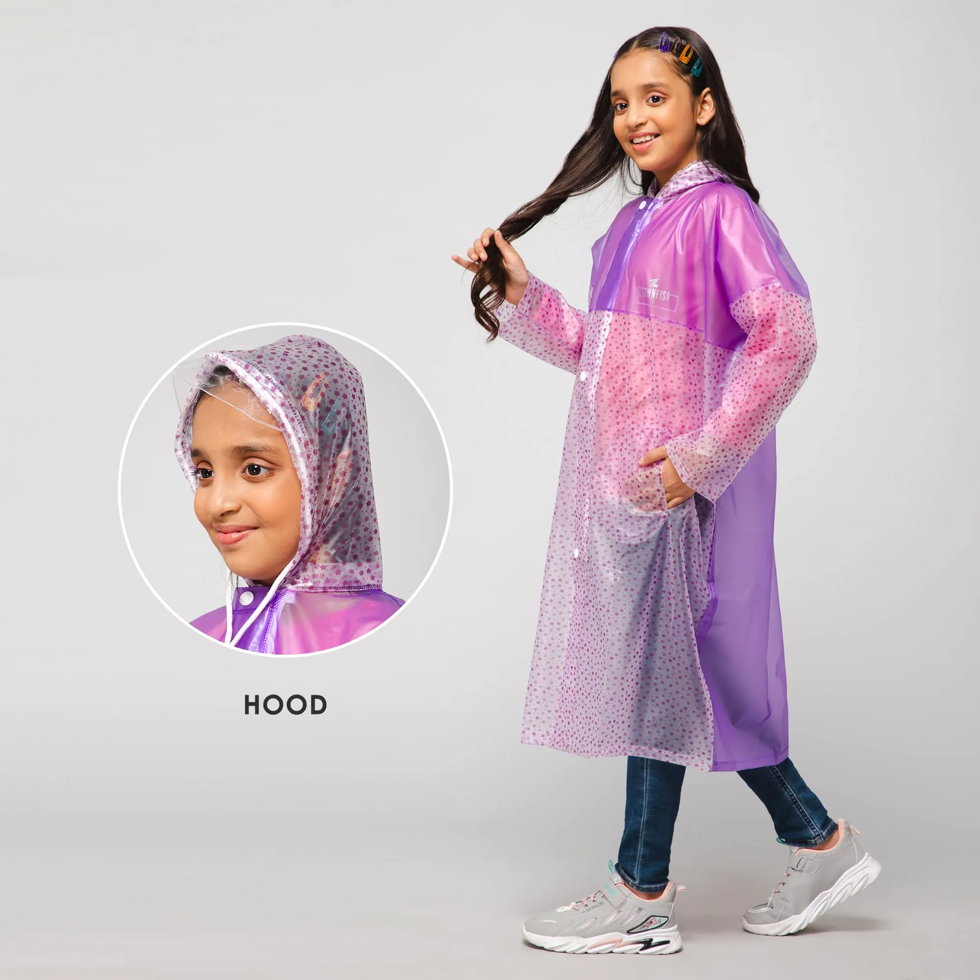 THE CLOWNFISH Misty Magic Series Unisex Kids Waterproof Single Layer PVC Longcoat/Raincoat with Adjustable Hood. Age-6-7 Years (Purple)